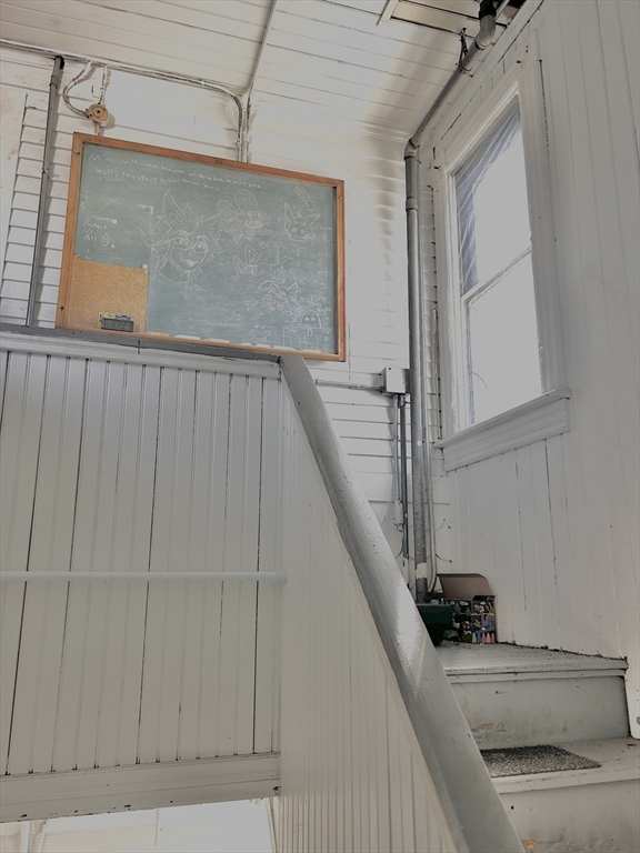 755 Grattan Street Chicopee, MA 01020 - Photo 20 of 39 a view of a staircase and kitchen view