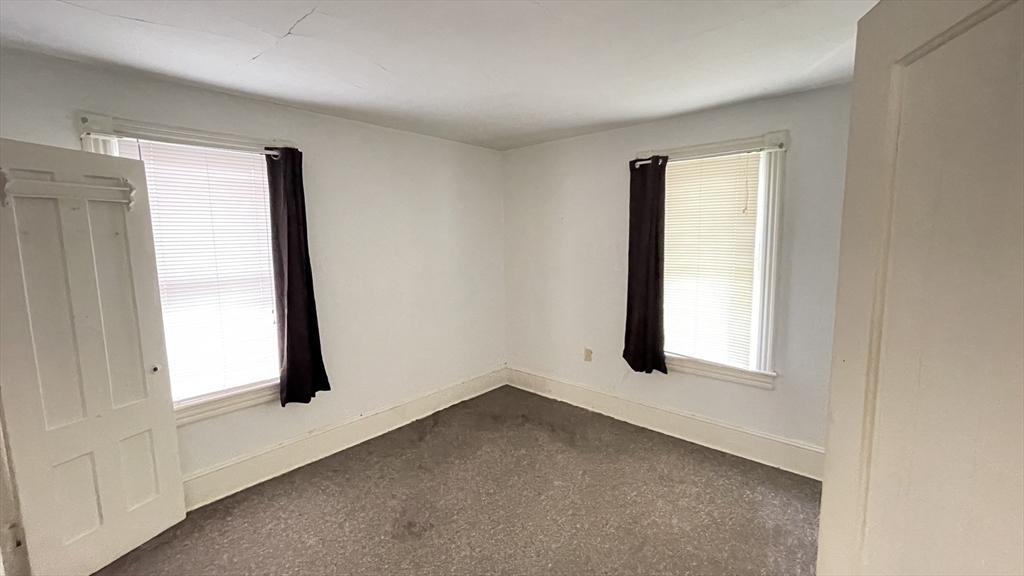 755 Grattan Street Chicopee, MA 01020 - Photo 29 of 39 an empty room with windows