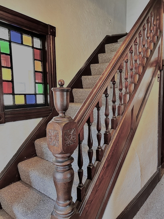 755 Grattan Street Chicopee, MA 01020 - Photo 6 of 39 a bathroom with furniture and a large window