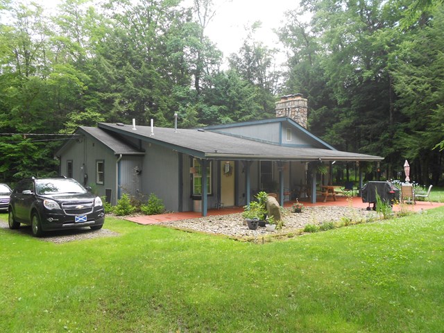 1741 Greenwood Road Marienville, PA 16239 - Photo 1 of 1 a front view of a house with sitting area and garden