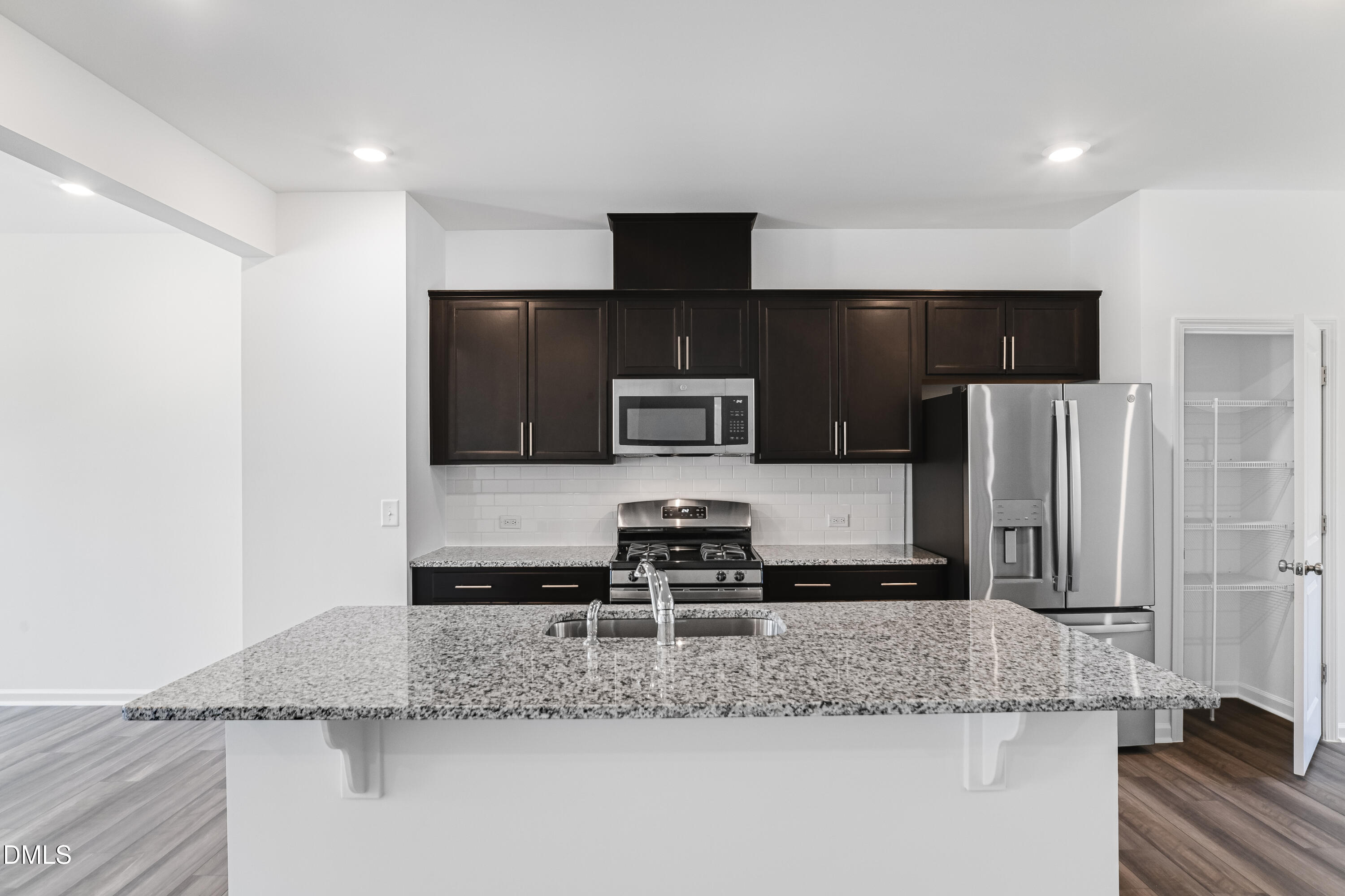 1441 Jay Road Knightdale, NC 27545 - Photo 6 of 56 SUN_Stoneriver_Pic_Colton_Kitchen_3of7