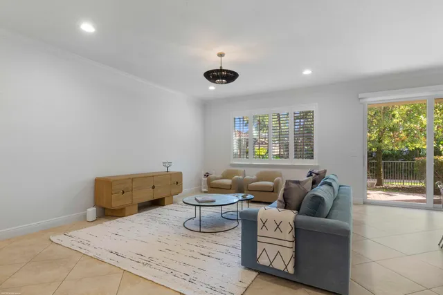 a bedroom with furniture and windows