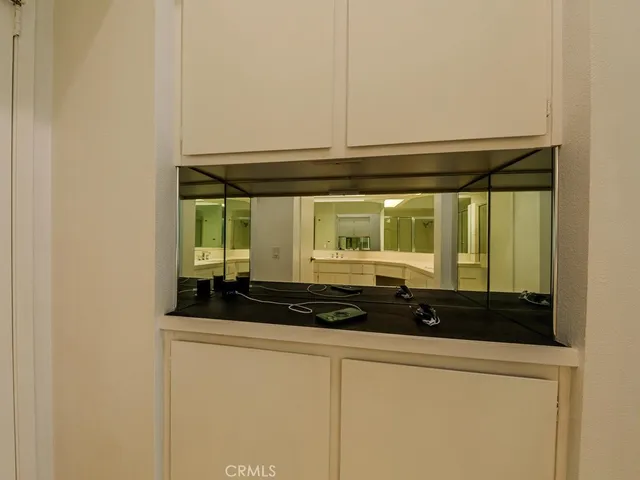 a bathroom with a sink and a window