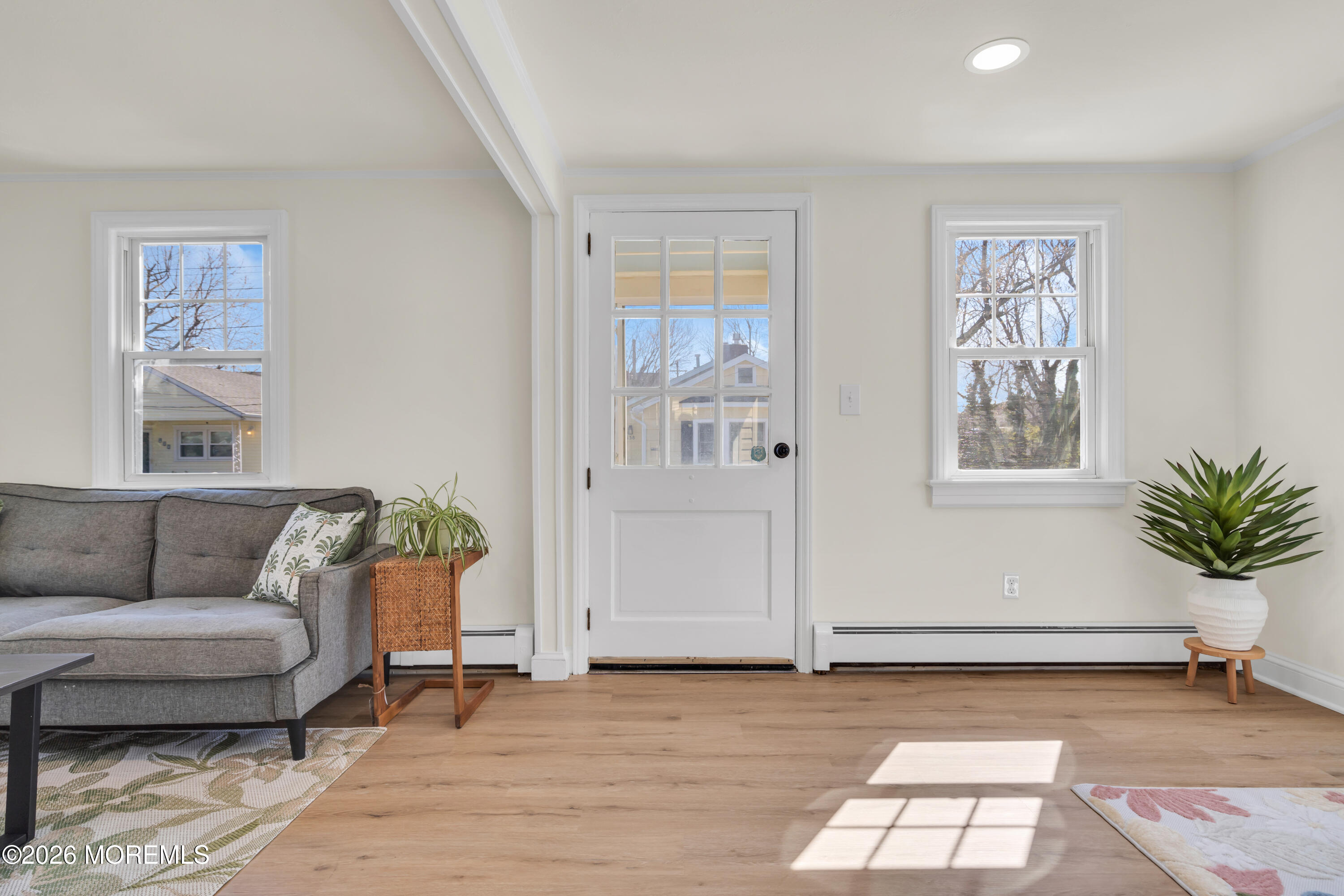 137 Inskip Avenue Ocean Grove, NJ 07756 - Photo 24 of 36 a living room with furniture and window