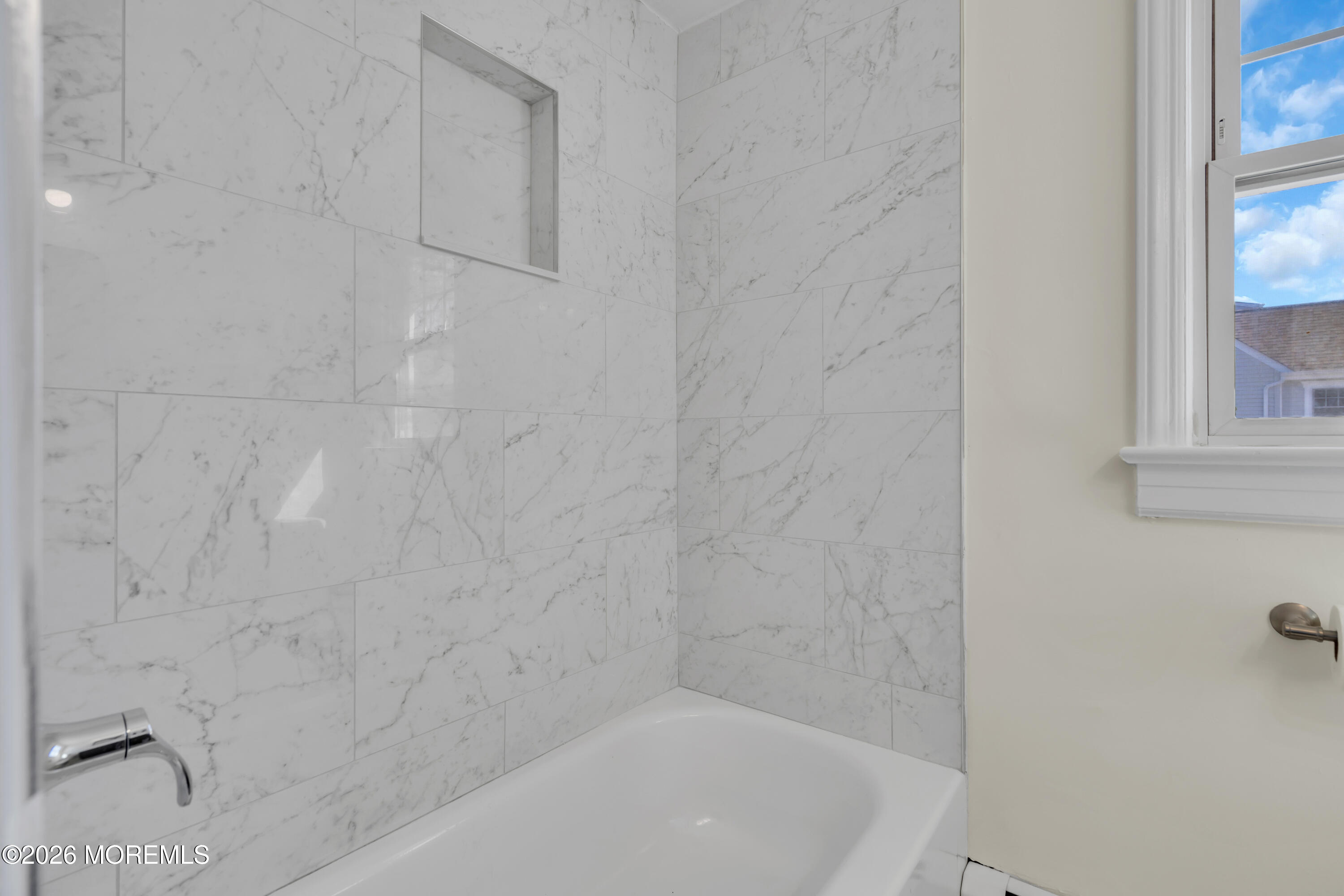 137 Inskip Avenue Ocean Grove, NJ 07756 - Photo 29 of 36 a bathroom with a bathtub