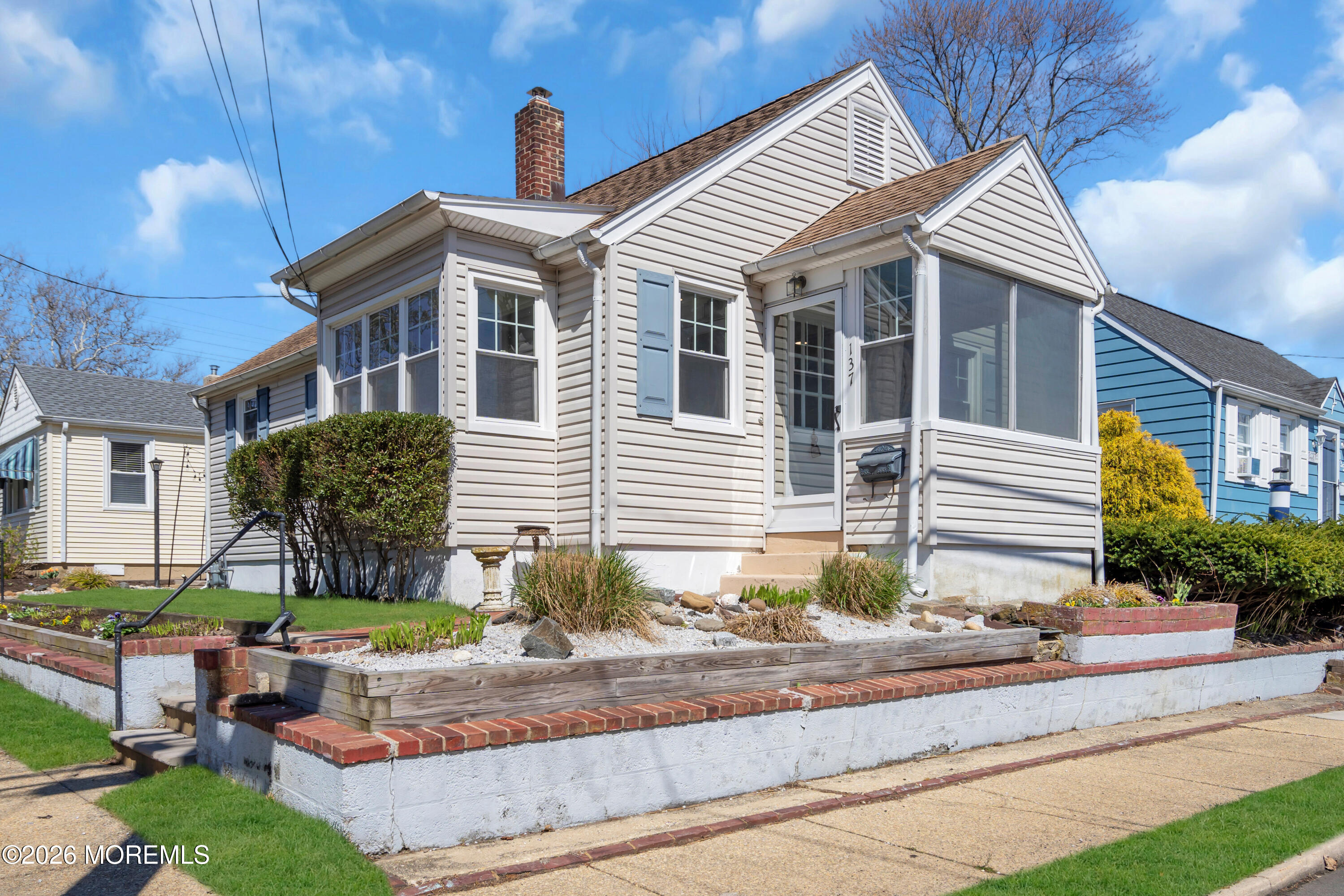 137 Inskip Avenue Ocean Grove, NJ 07756 - Photo 3 of 36 a front view of a house with garden