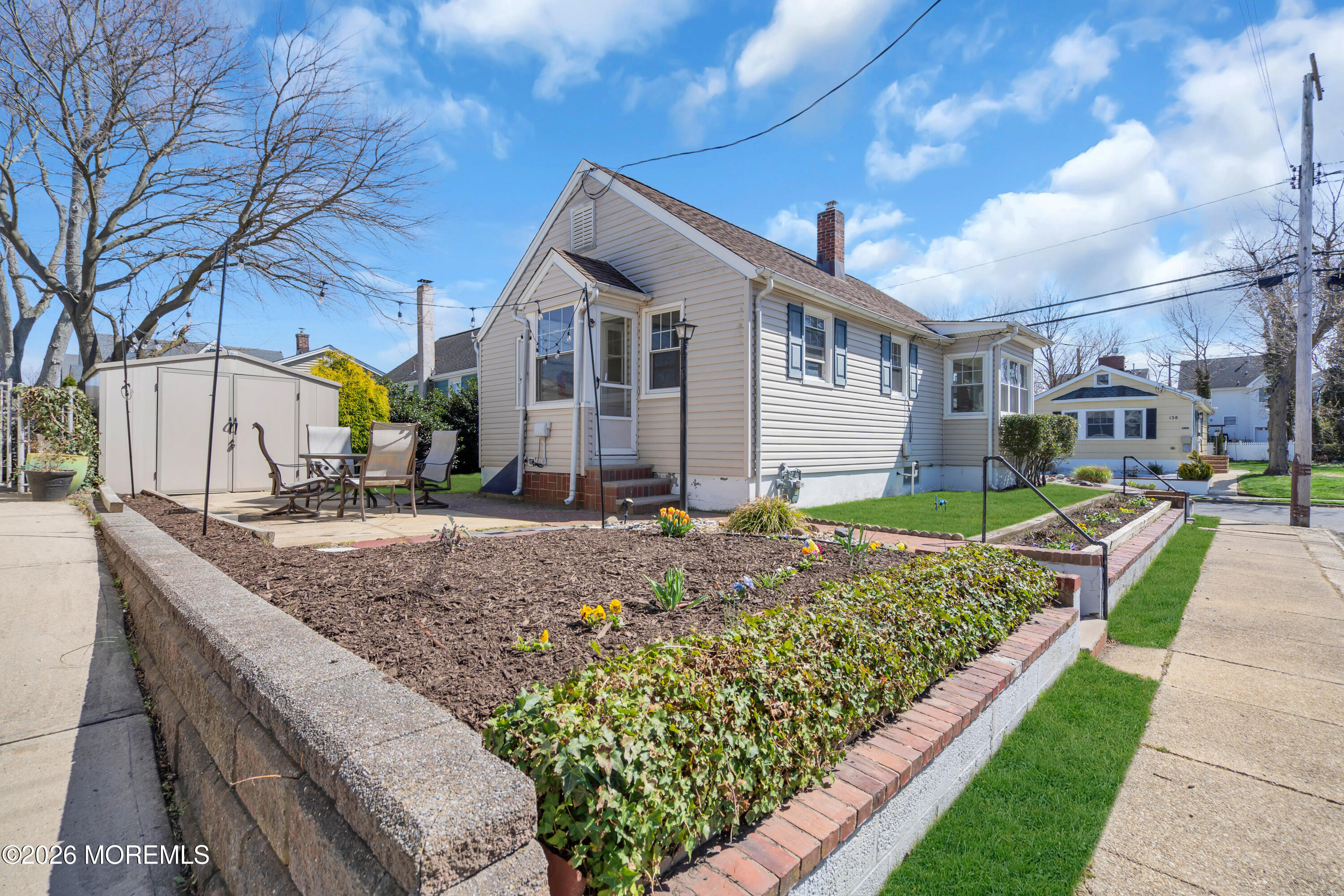 137 Inskip Avenue Ocean Grove, NJ 07756 - Photo 7 of 36 a front view of a house with garden