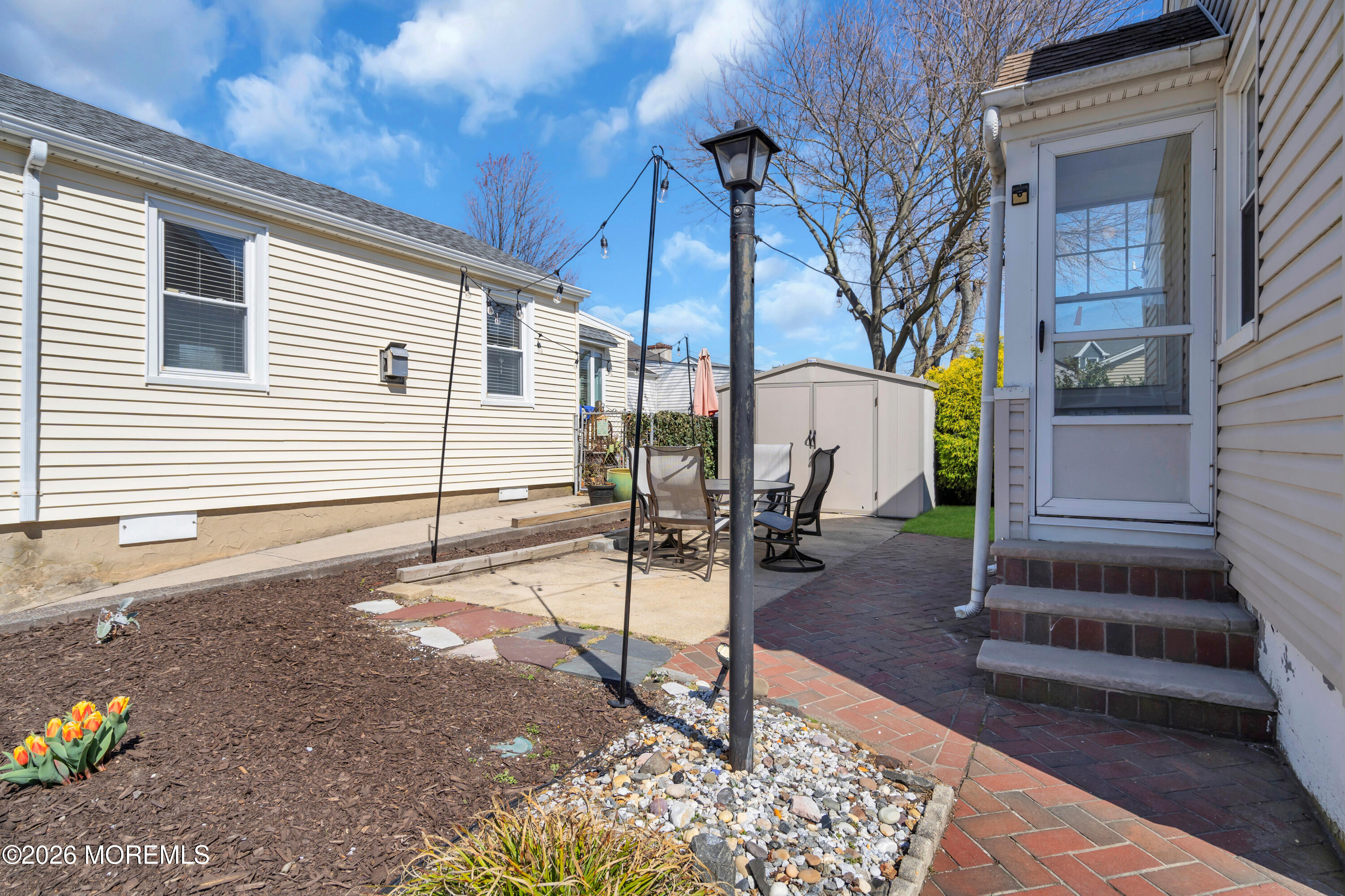 137 Inskip Avenue Ocean Grove, NJ 07756 - Photo 9 of 36 a view of a house with backyard