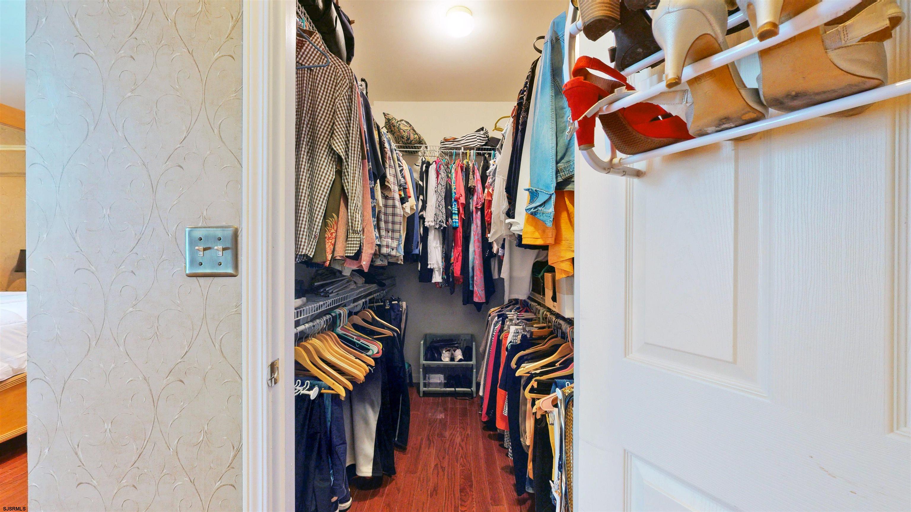 62 Ables Run Drive Absecon, NJ 08201 - Photo 18 of 38 a view of walk in closet with clothes
