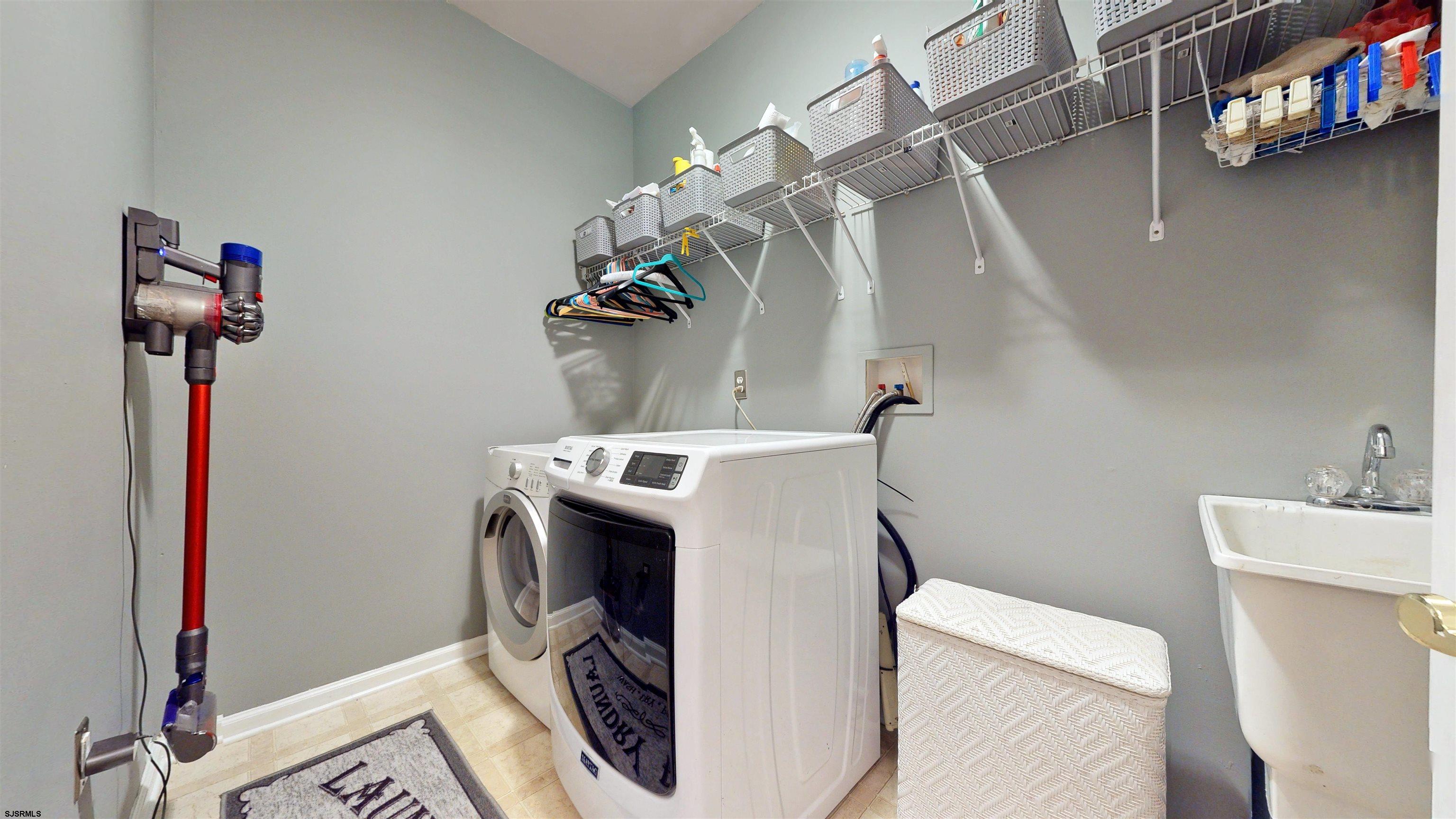 62 Ables Run Drive Absecon, NJ 08201 - Photo 20 of 38 a utility room with dryer and washer