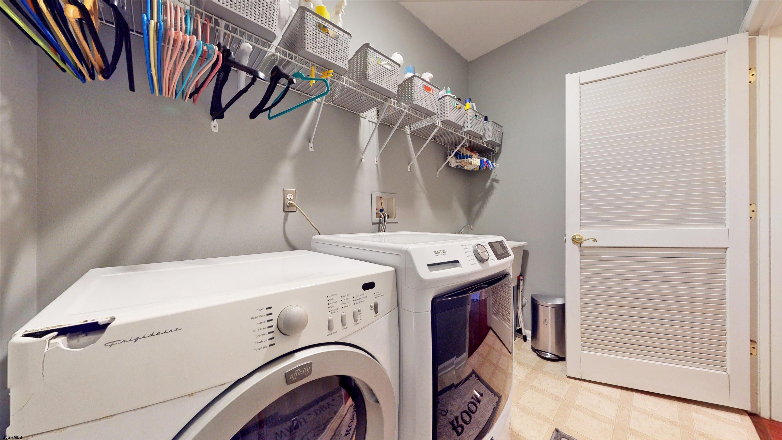 62 Ables Run Drive Absecon, NJ 08201 - Photo 21 of 38 a utility room with dryer and washer