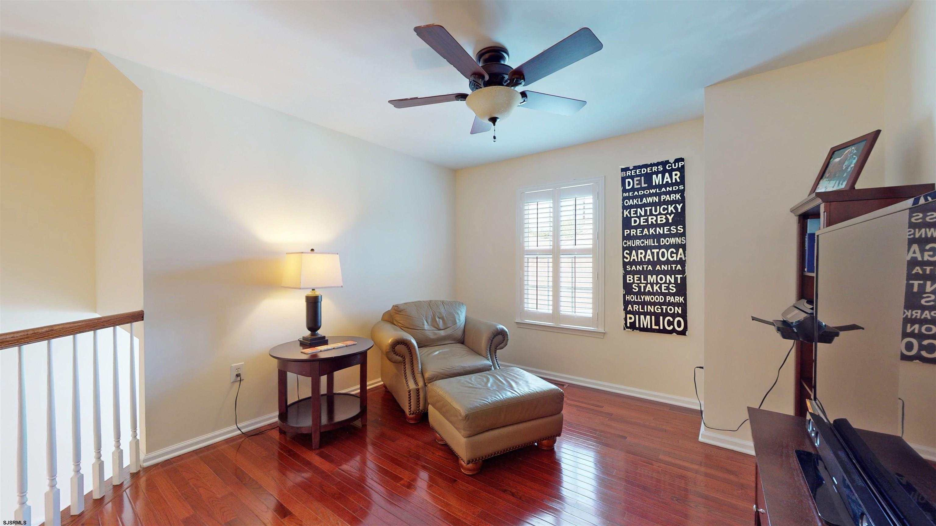 62 Ables Run Drive Absecon, NJ 08201 - Photo 25 of 38 a living room with furniture a window and wooden floor