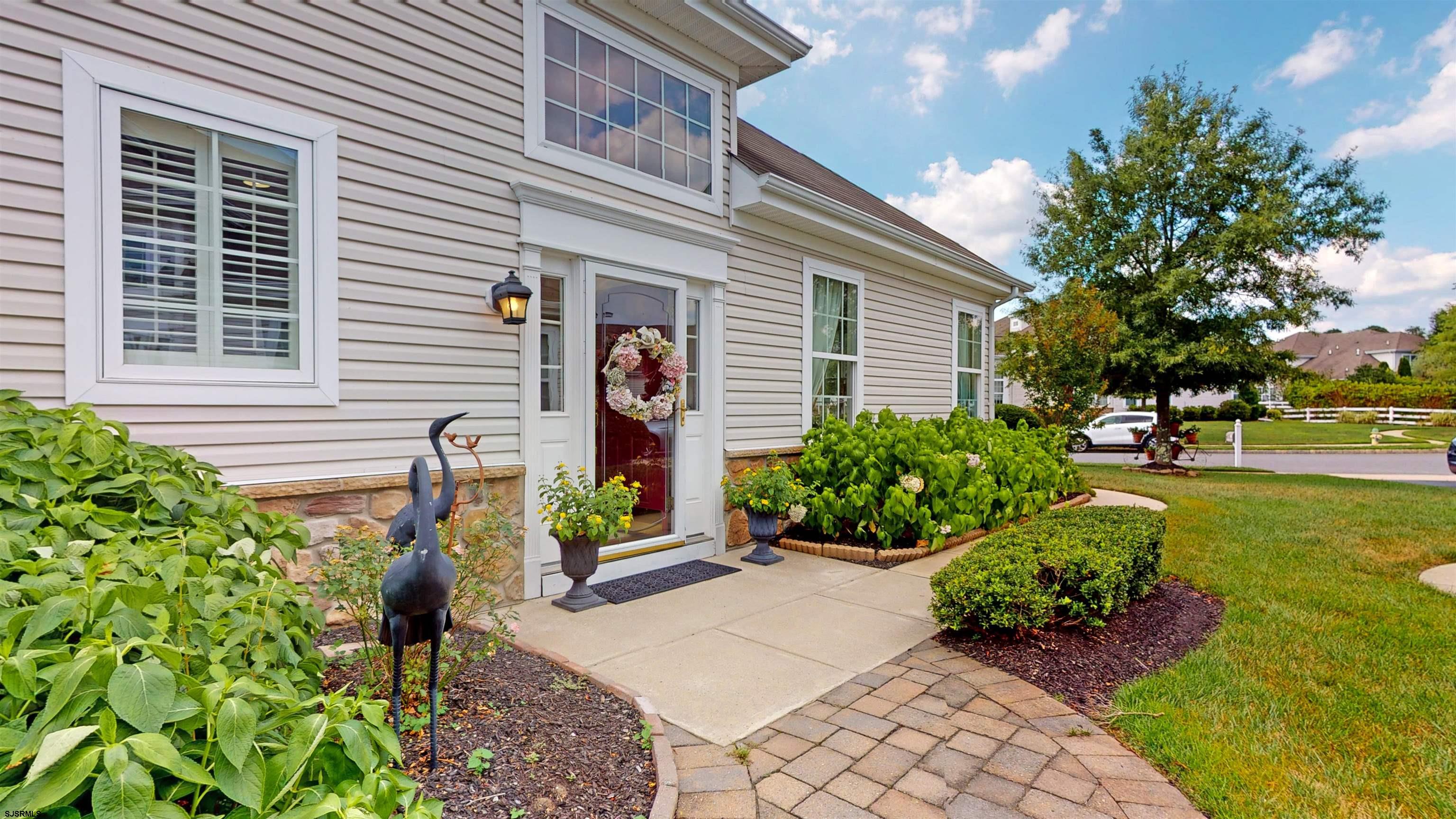 62 Ables Run Drive Absecon, NJ 08201 - Photo 3 of 38 a view of a back yard of the house