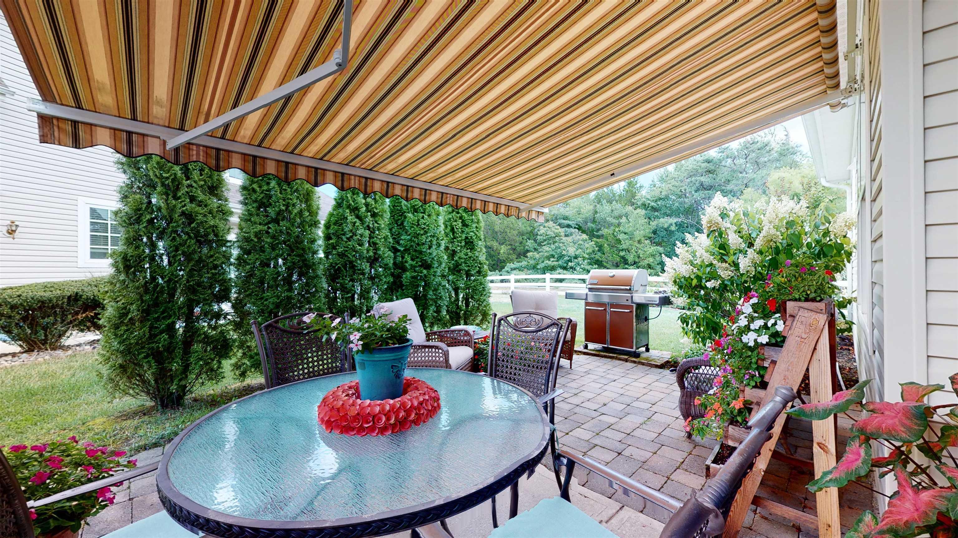 62 Ables Run Drive Absecon, NJ 08201 - Photo 32 of 38 a backyard of a house with a garden view