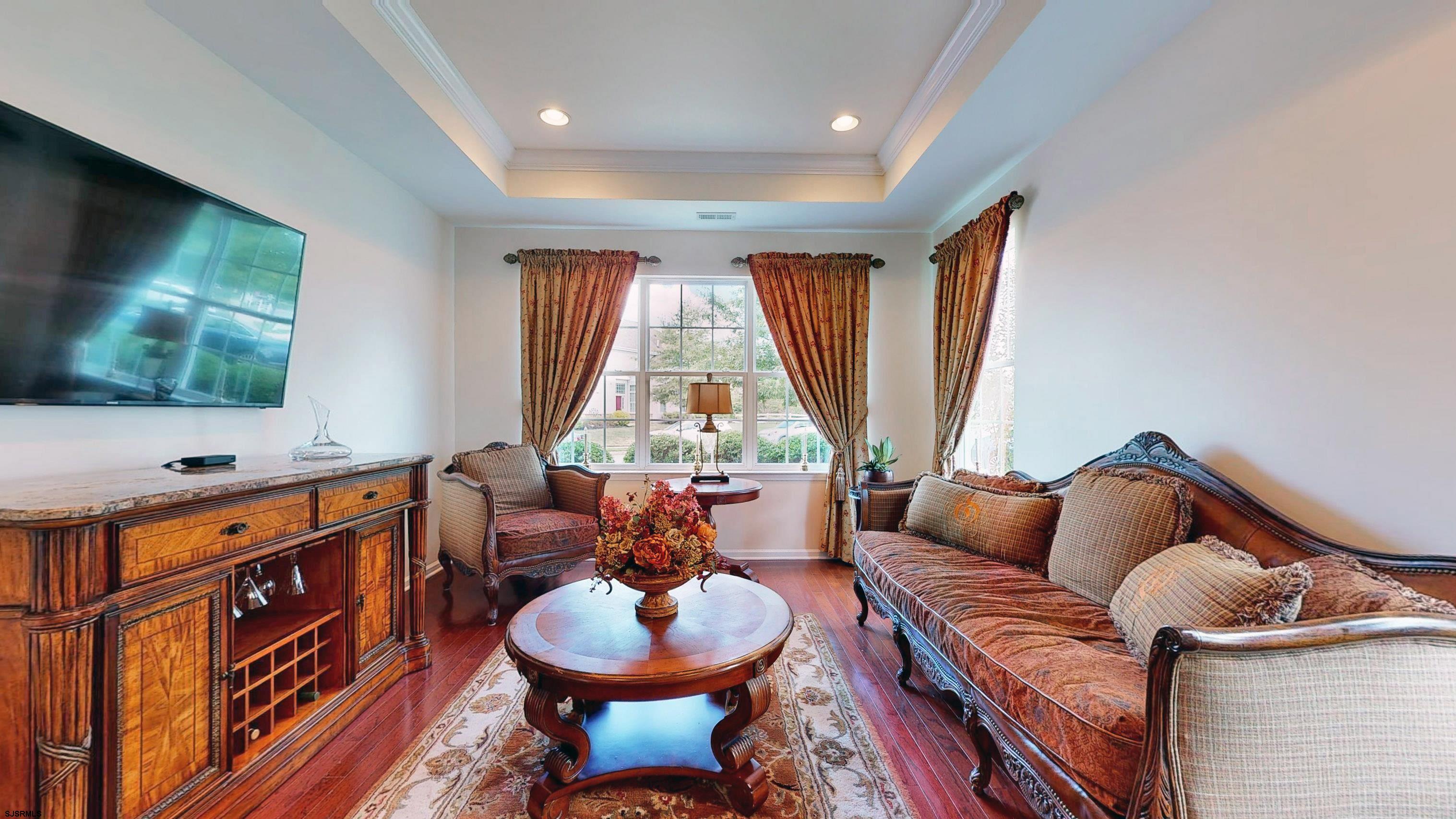 62 Ables Run Drive Absecon, NJ 08201 - Photo 6 of 38 a living room with furniture and a flat screen tv