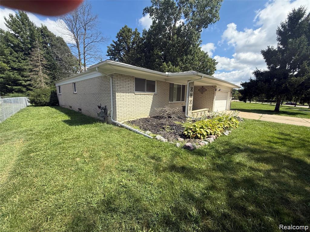 43038 Hanford Road Canton, MI 48187 - Photo 2 of 36 Brick ranch-style residence featuring a prominent front entrance and an attached garage