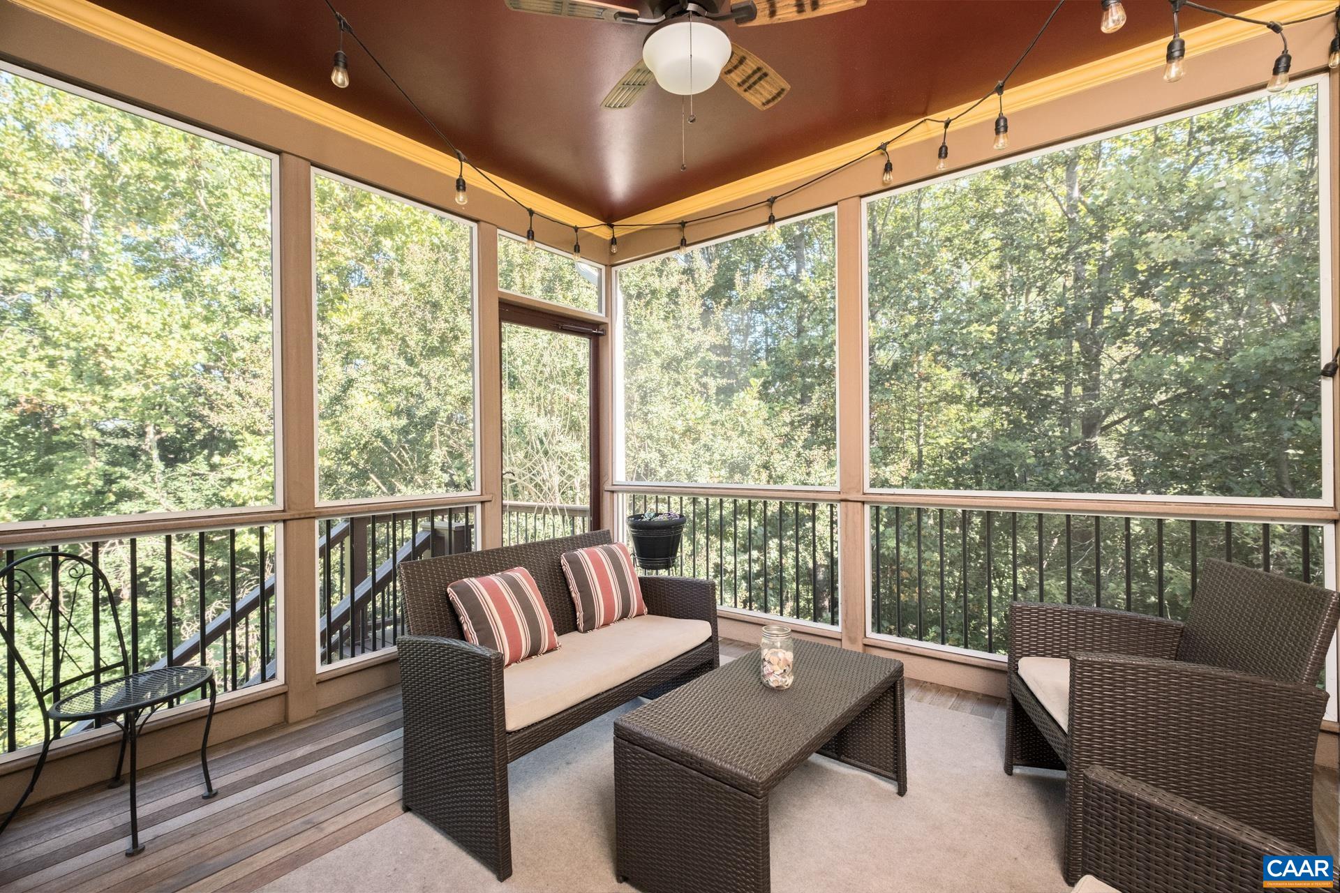 3070 Chimney Ridge Charlottesville, VA 22911 - Photo 41 of 50 Screened porch overlooks private backyard - mahogany floors and ceiling fan.