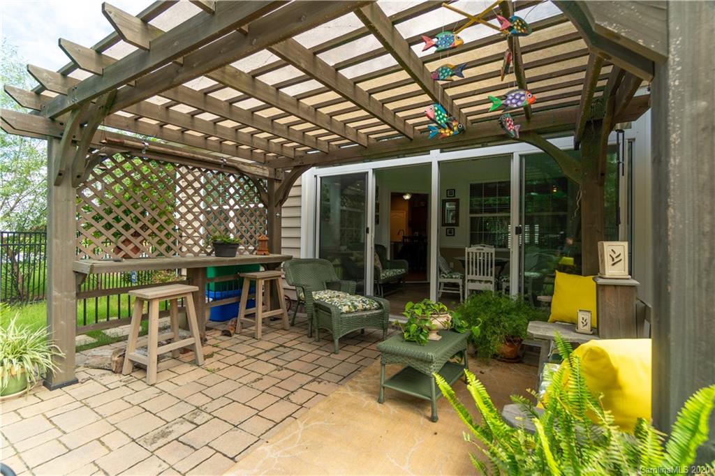 4051 Perth Road Indian Land, SC 29707 - Photo 28 of 31 a view of a patio with a table and chairs