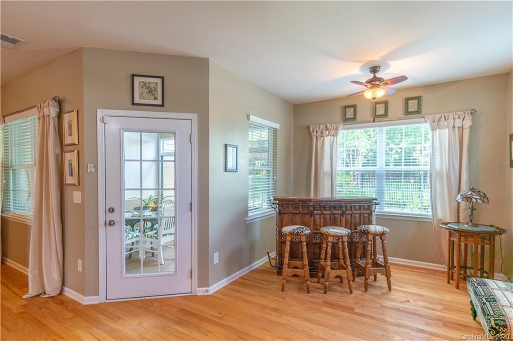 4051 Perth Road Indian Land, SC 29707 - Photo 9 of 31 a view of a dining room with furniture window and wooden floor