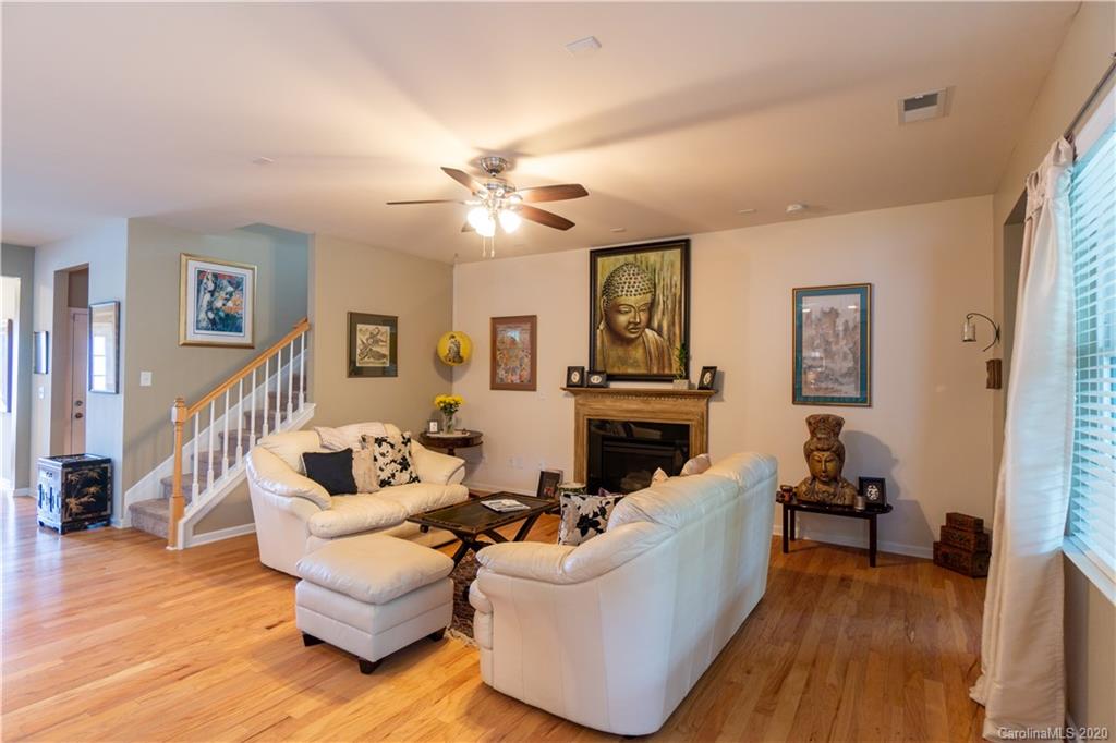 4051 Perth Road Indian Land, SC 29707 - Photo 10 of 31 a living room with furniture and a fireplace