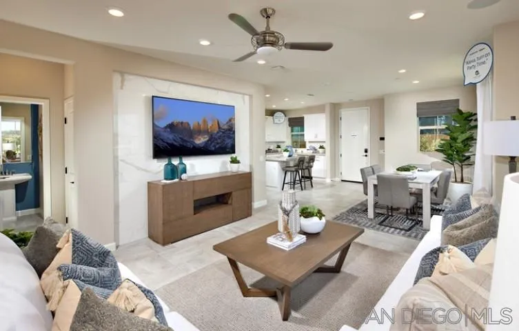 1099 Delpy View Point Vista, CA 92084 - Photo 5 of 15 a living room with furniture and a flat screen tv