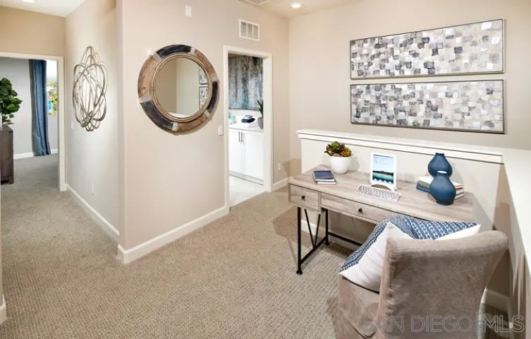 1099 Delpy View Point Vista, CA 92084 - Photo 7 of 15 a view of a room that has a table and a chair