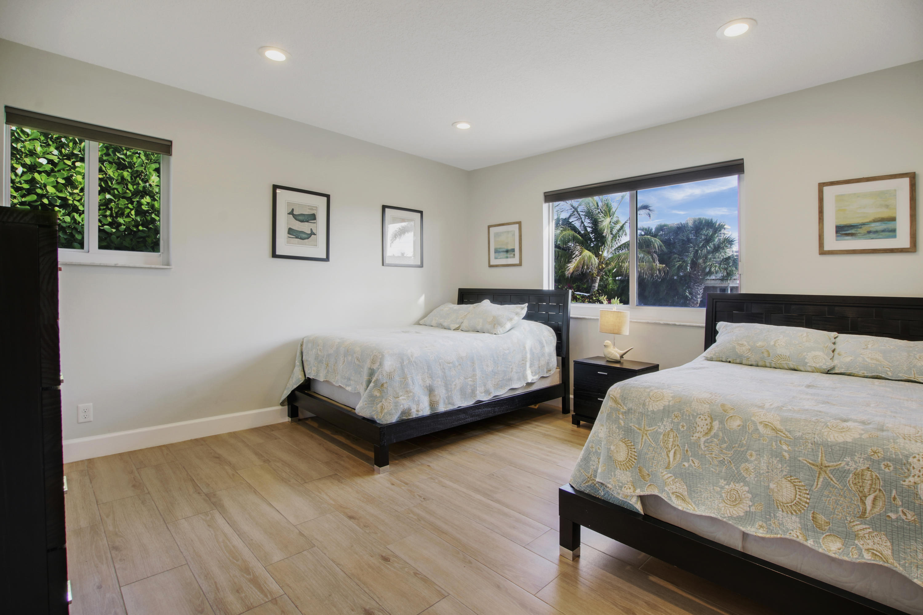 380 North Juno Lane Juno Beach, FL 33408 - Photo 12 of 22 a bedroom with double bed and a window