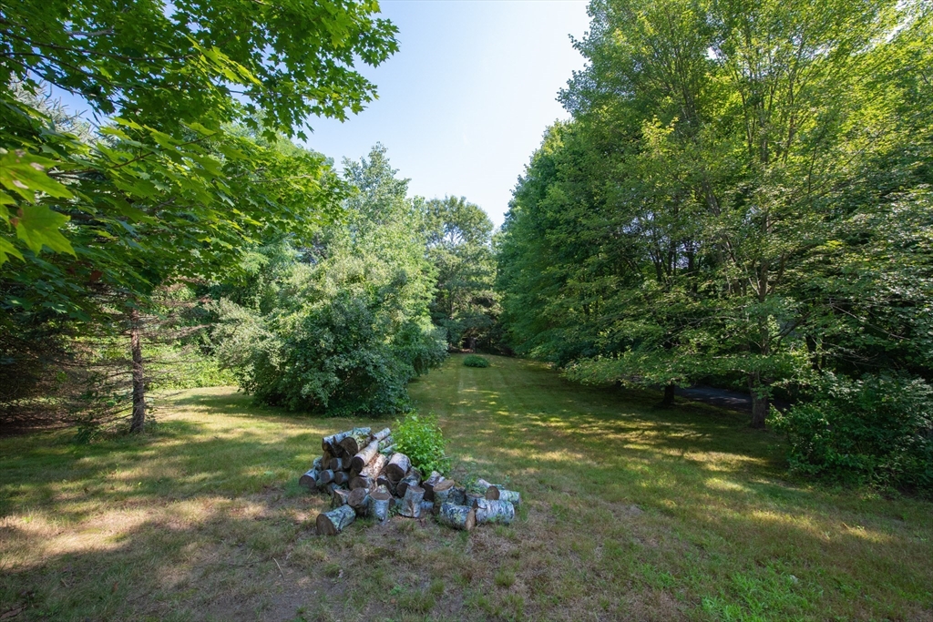 110 Mendon Road Northbridge, MA 01534 - Photo 5 of 37 a backyard of a house with lots of green space