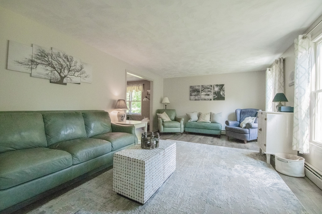 110 Mendon Road Northbridge, MA 01534 - Photo 10 of 37 a living room with furniture and a couch