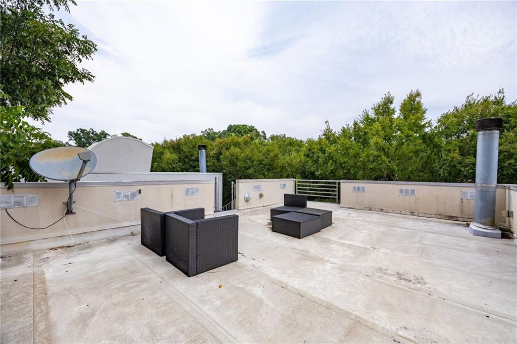 2176 Millennium Way Atlanta, GA 30319 - Photo 15 of 16 a view of roof with sitting area