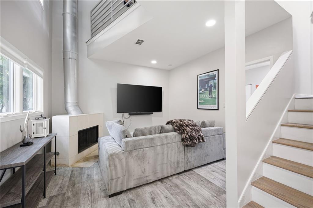 2176 Millennium Way Atlanta, GA 30319 - Photo 3 of 16 a living room with furniture and a flat screen tv
