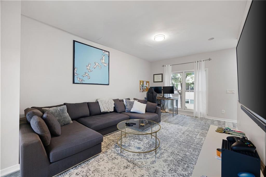 2176 Millennium Way Atlanta, GA 30319 - Photo 6 of 16 a living room with furniture and a couch