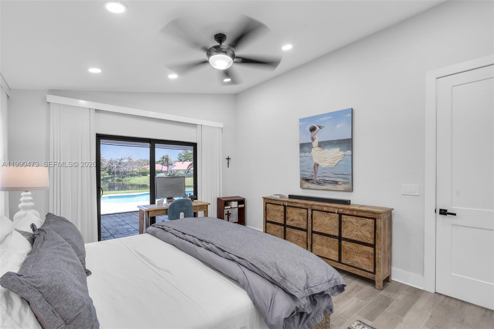 2920 Old Orchard Road Davie, FL 33328 - Photo 25 of 62 a bed room with a bed and a large window