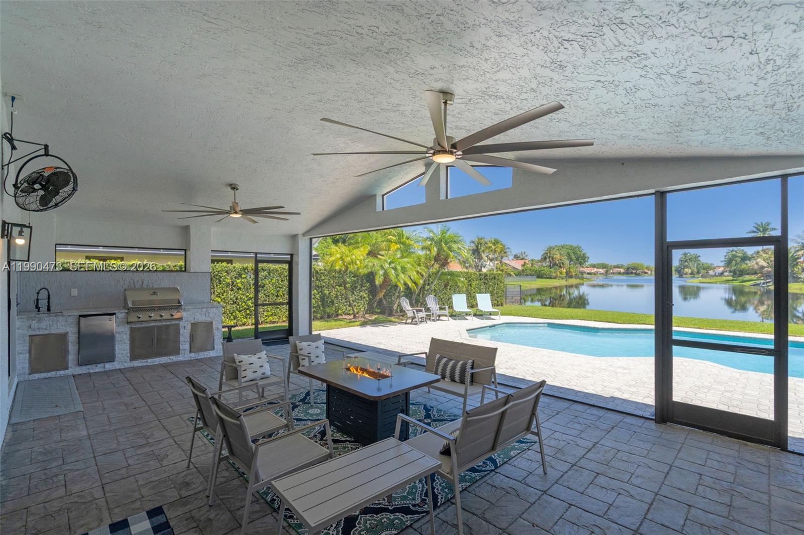 2920 Old Orchard Road Davie, FL 33328 - Photo 35 of 62 an outdoor view with patio