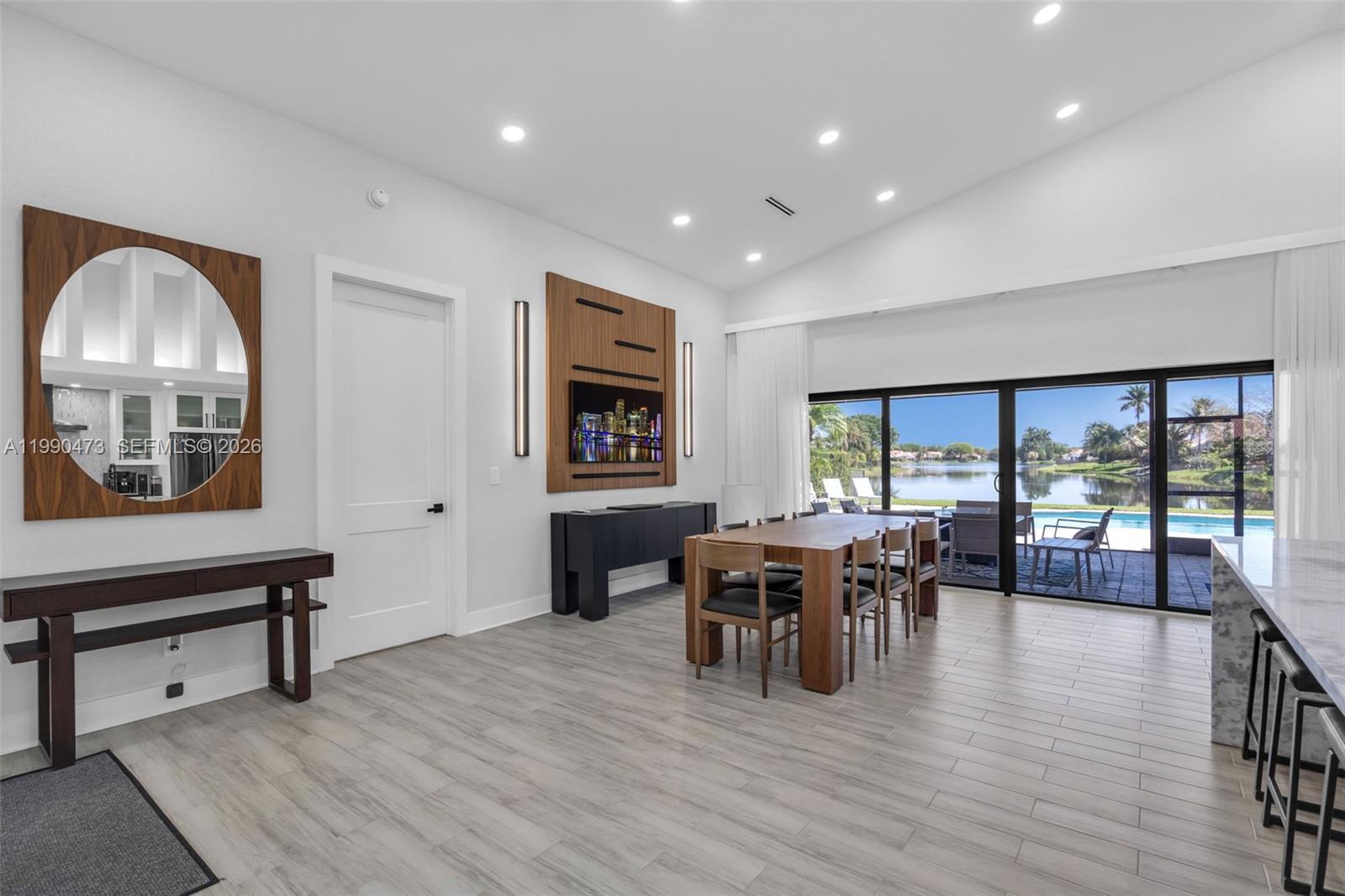 2920 Old Orchard Road Davie, FL 33328 - Photo 4 of 62 a view of a dining room with furniture window and wooden floor