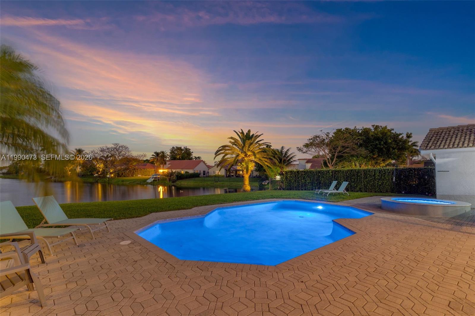 2920 Old Orchard Road Davie, FL 33328 - Photo 51 of 62 a view of a swimming pool with an ocean view