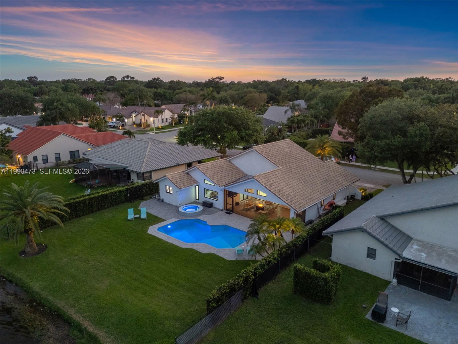2920 Old Orchard Road Davie, FL 33328 - Photo 57 of 62 an aerial view of residential houses with outdoor space