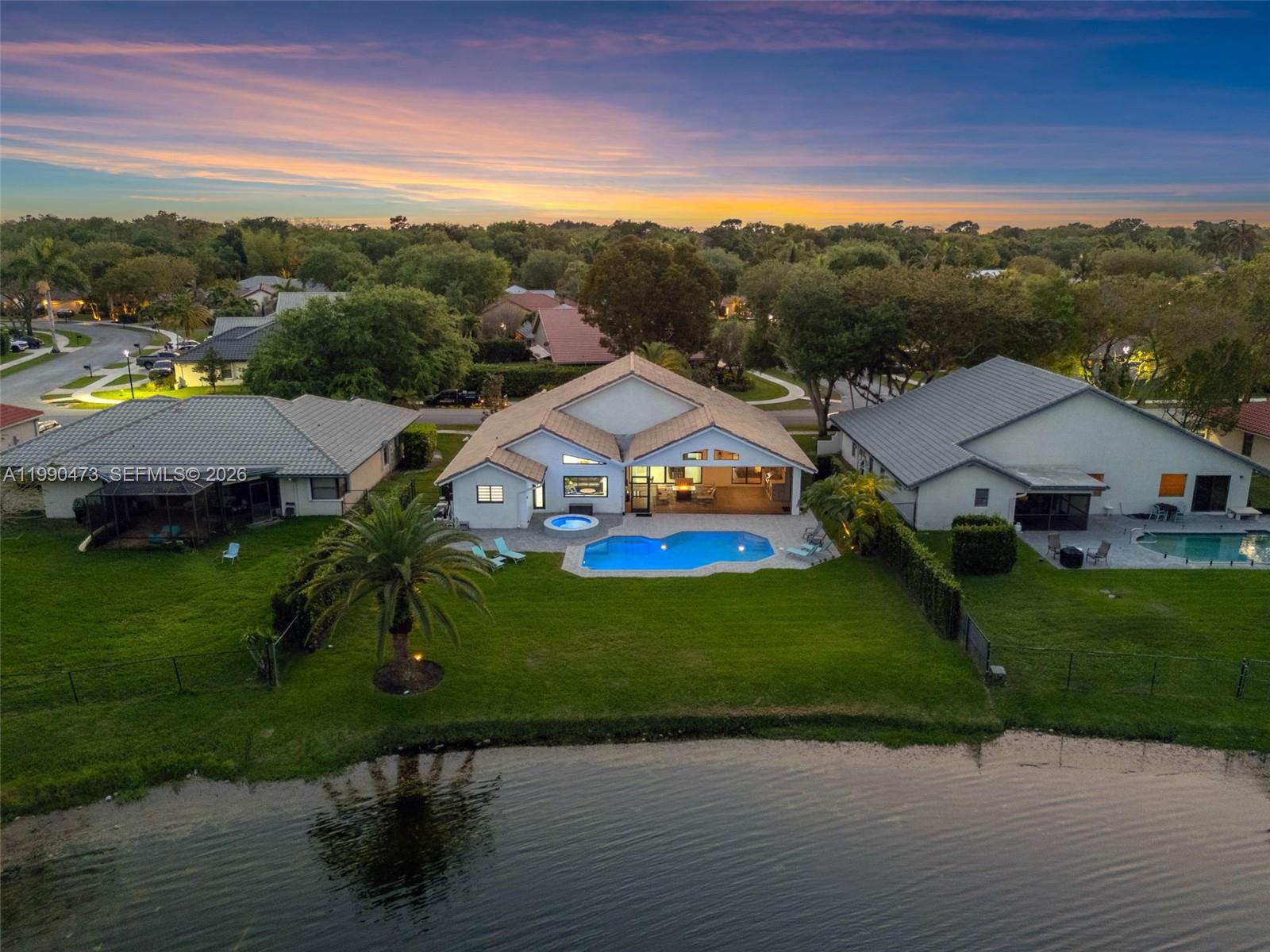 2920 Old Orchard Road Davie, FL 33328 - Photo 58 of 62 an aerial view of a house with a garden