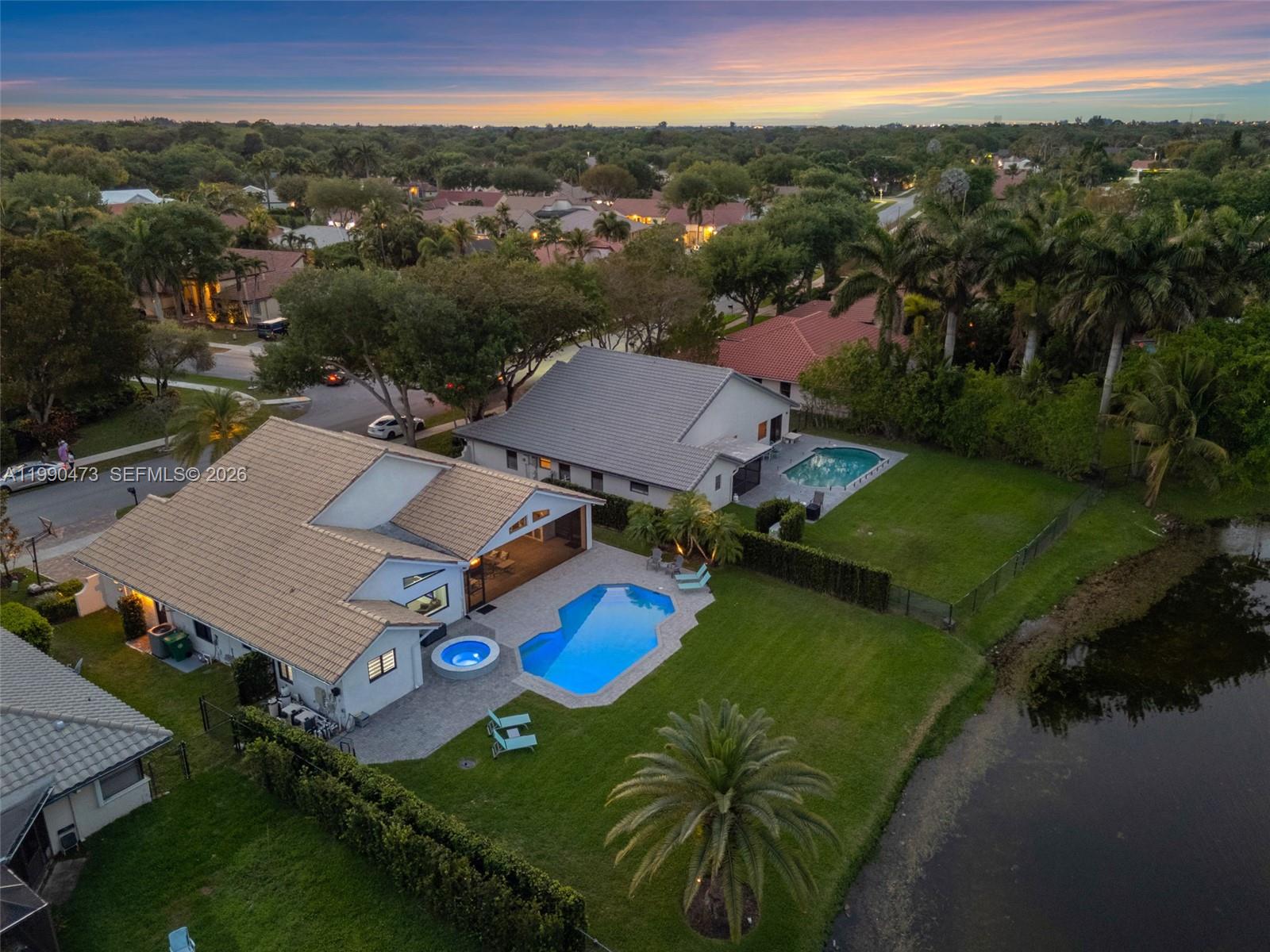 2920 Old Orchard Road Davie, FL 33328 - Photo 59 of 62 an aerial view of a house with a garden