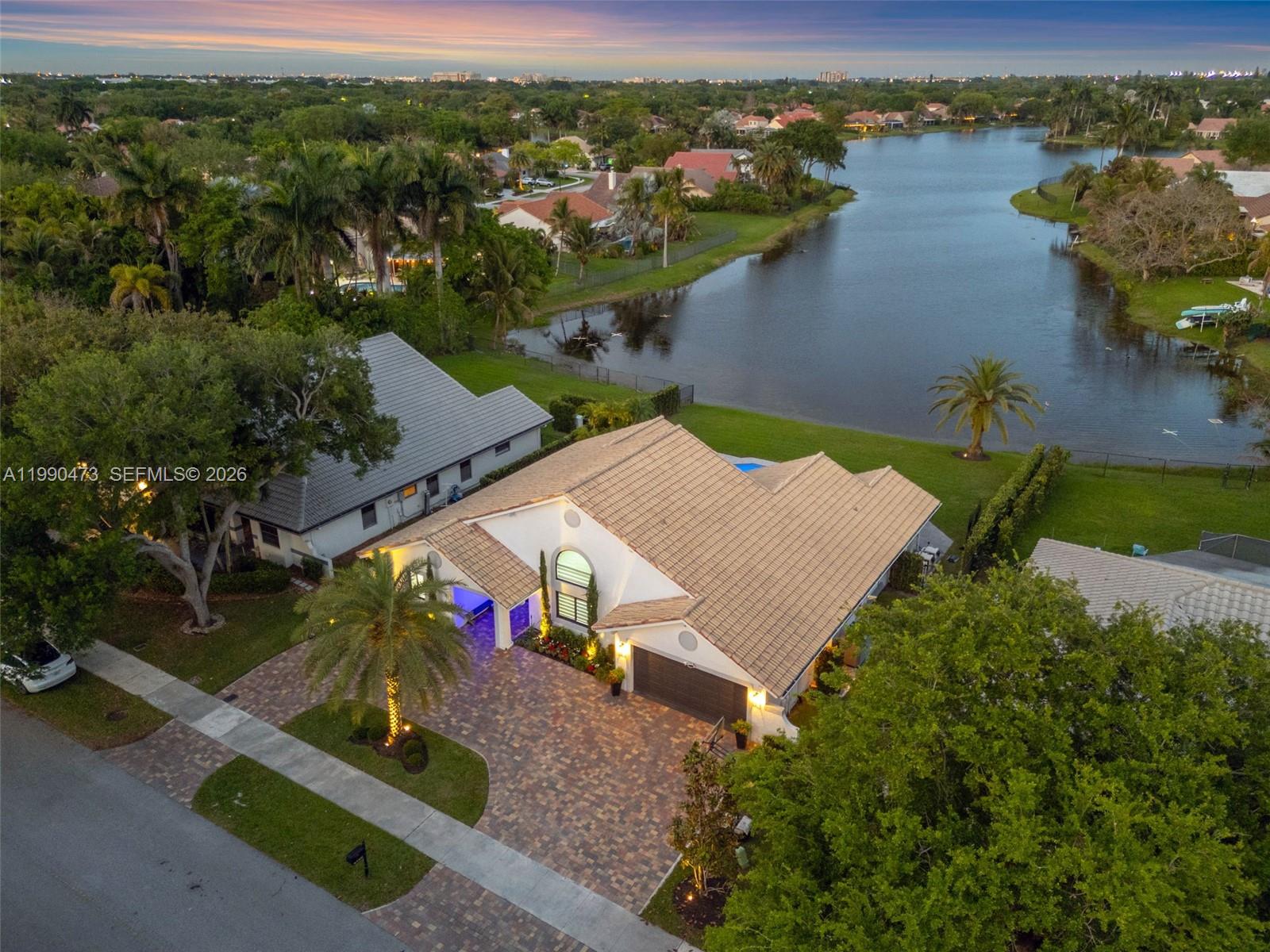 2920 Old Orchard Road Davie, FL 33328 - Photo 60 of 62 an aerial view of a house with a lake view