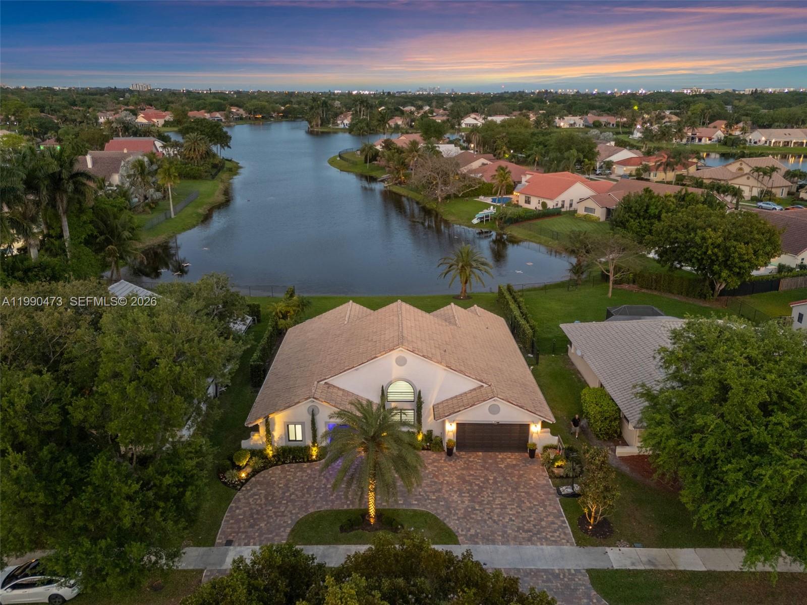 2920 Old Orchard Road Davie, FL 33328 - Photo 61 of 62 an aerial view of a house with a lake view