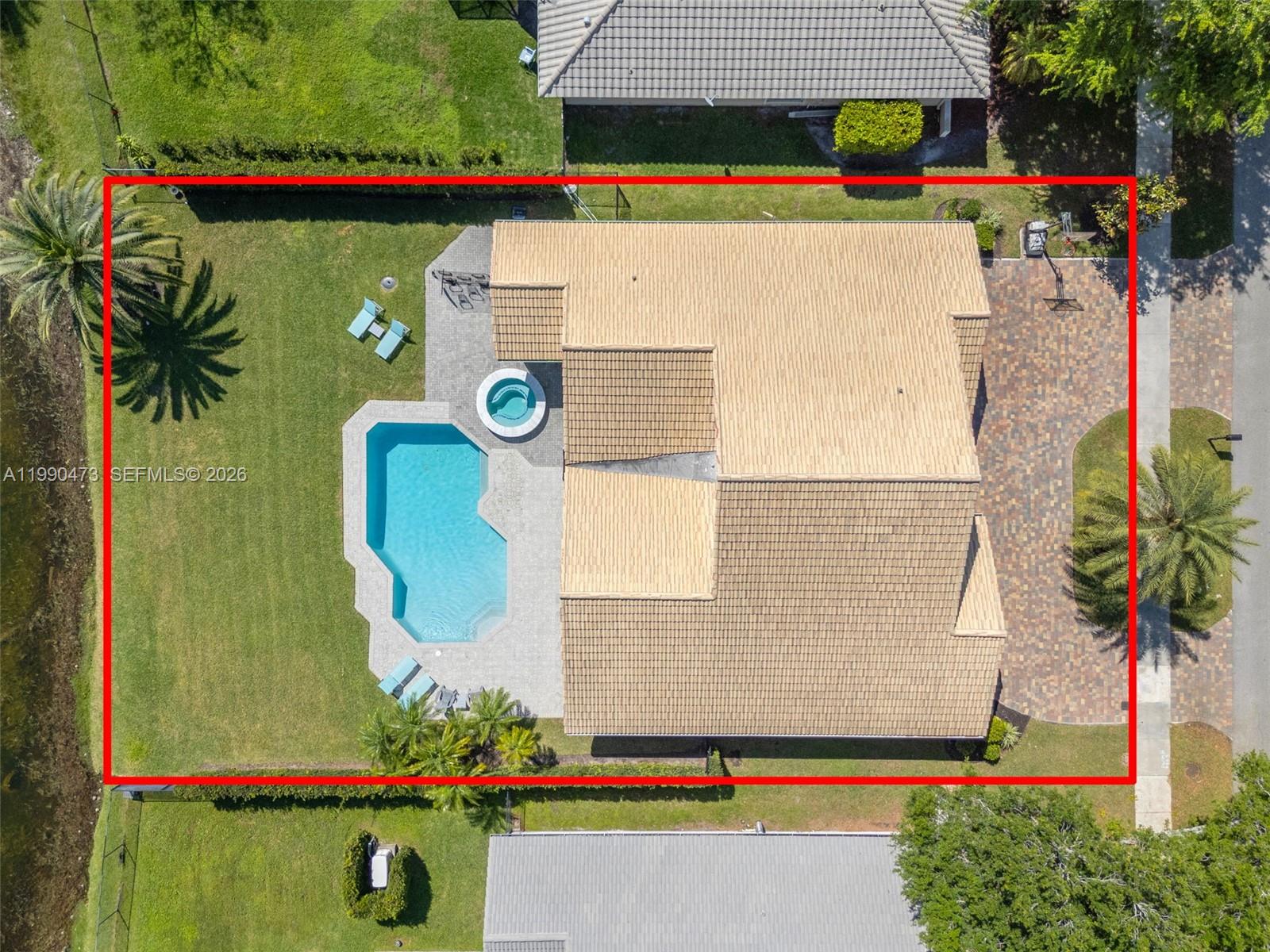 2920 Old Orchard Road Davie, FL 33328 - Photo 62 of 62 an aerial view of a house with a yard and tennis court