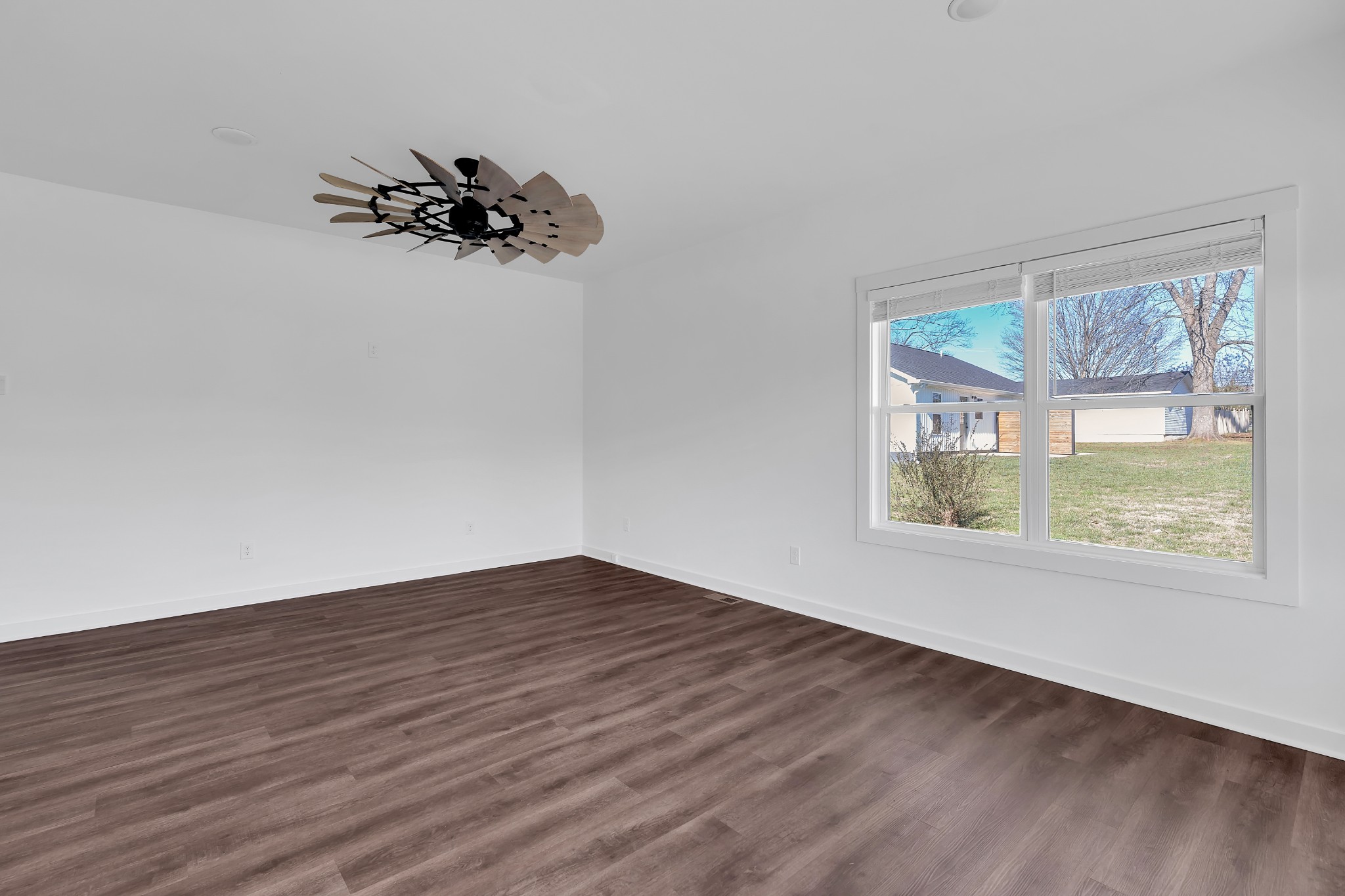 65 Duncan Lane Winchester, TN 37398 - Photo 26 of 55 a view of a room with wooden floor and a window