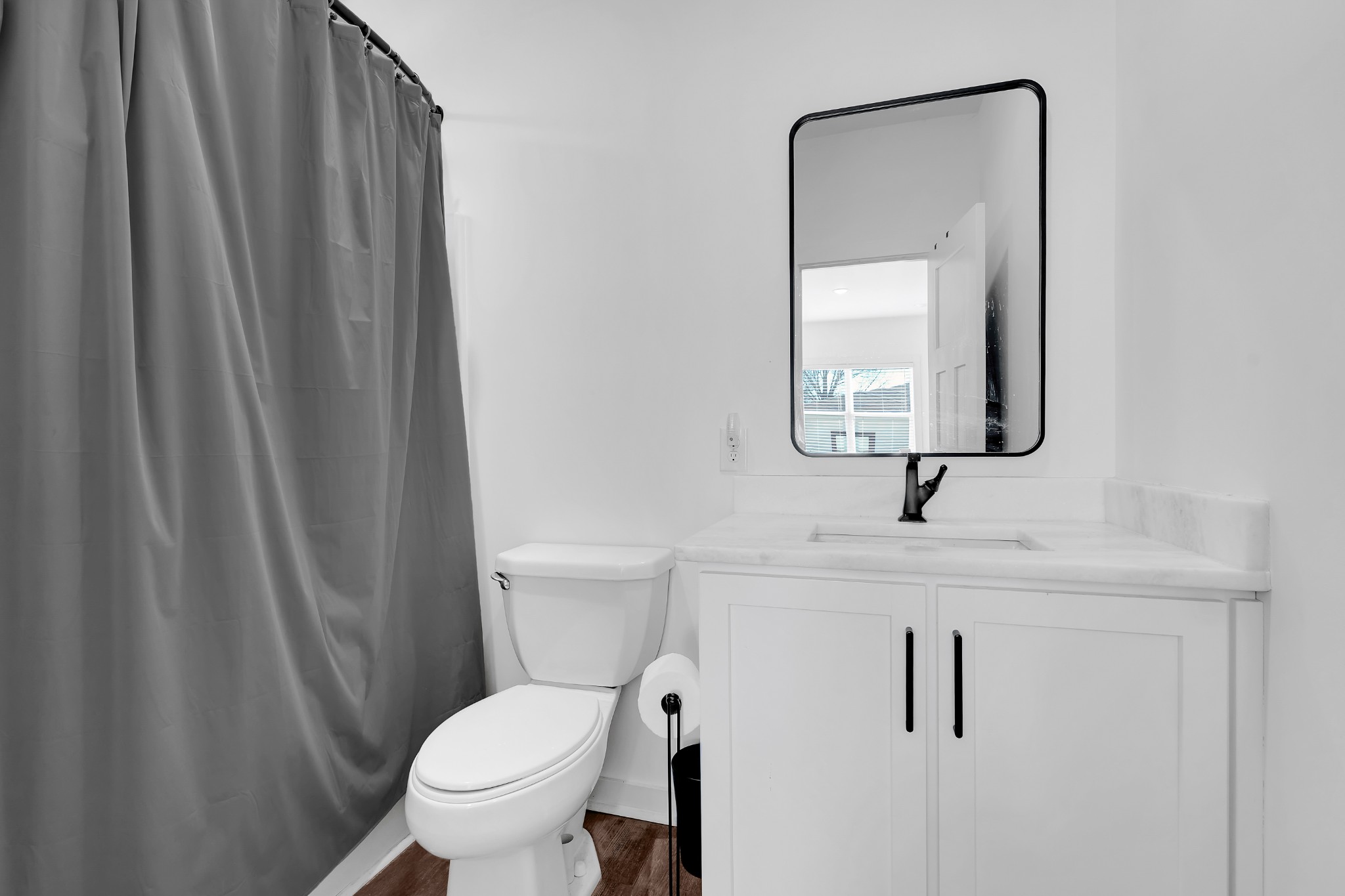 65 Duncan Lane Winchester, TN 37398 - Photo 45 of 55 a bathroom with a toilet a sink and mirror