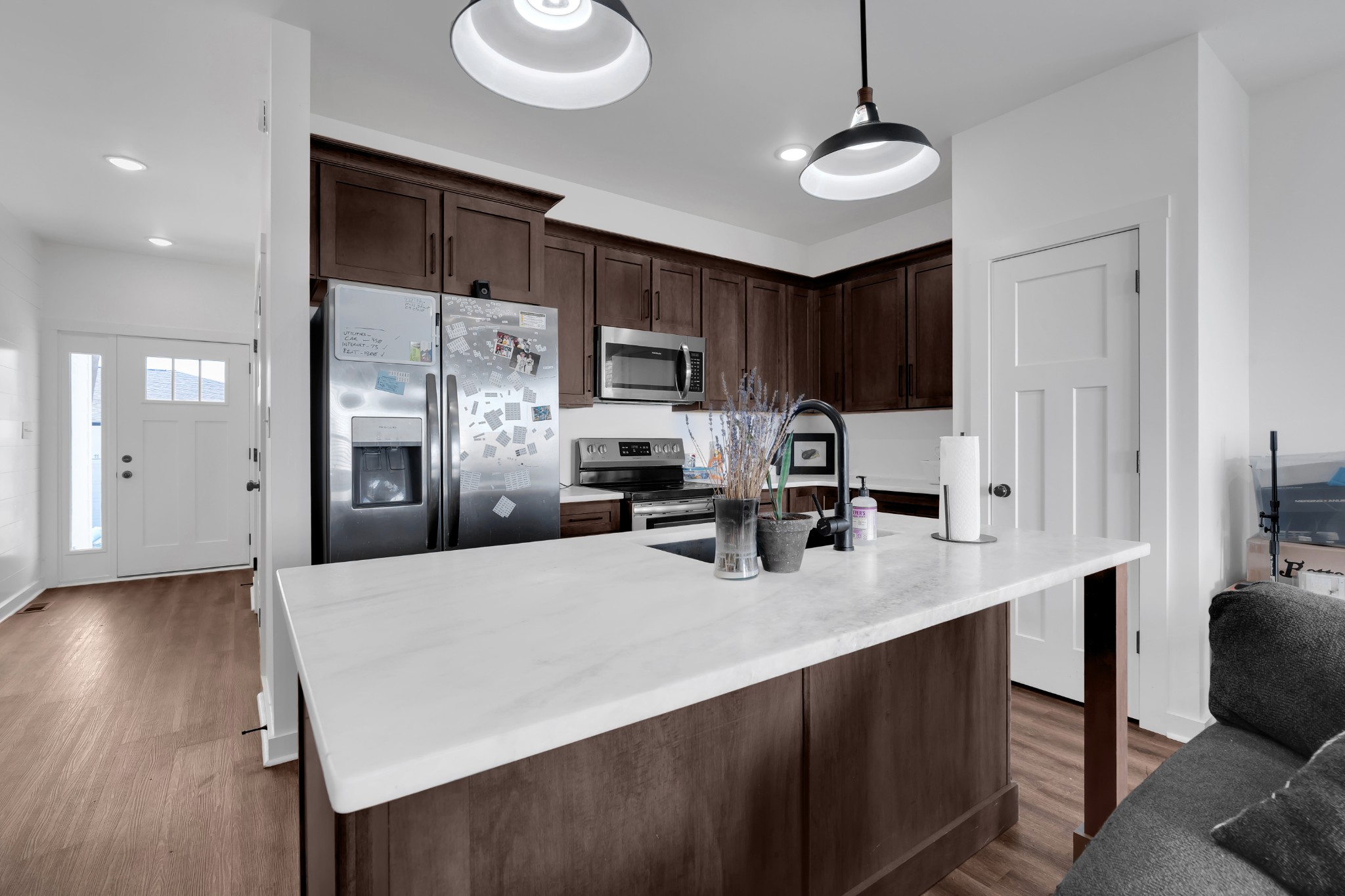 65 Duncan Lane Winchester, TN 37398 - Photo 51 of 55 a kitchen with kitchen island a sink appliances and cabinets