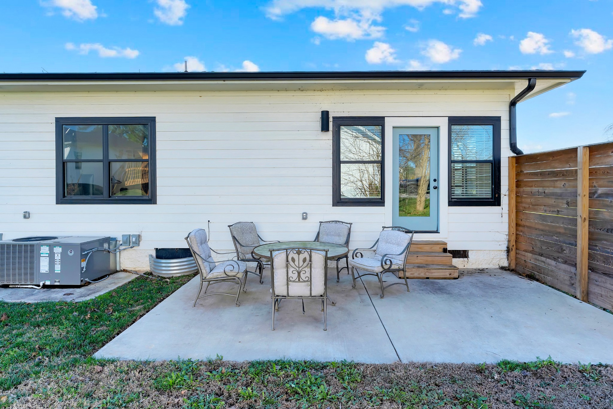 65 Duncan Lane Winchester, TN 37398 - Photo 55 of 55 a view of a patio with table and chairs and potted plants
