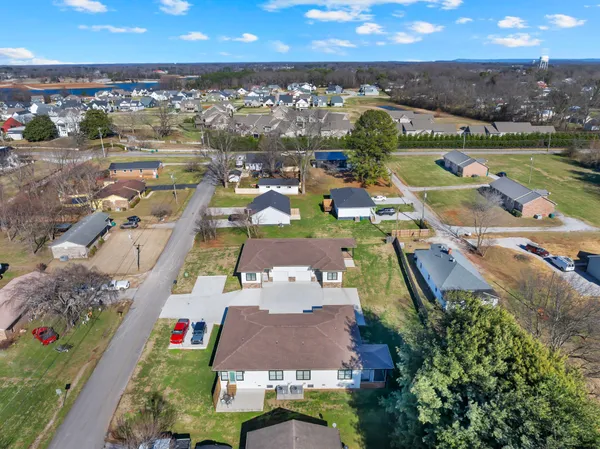 an aerial view of a house with a garden