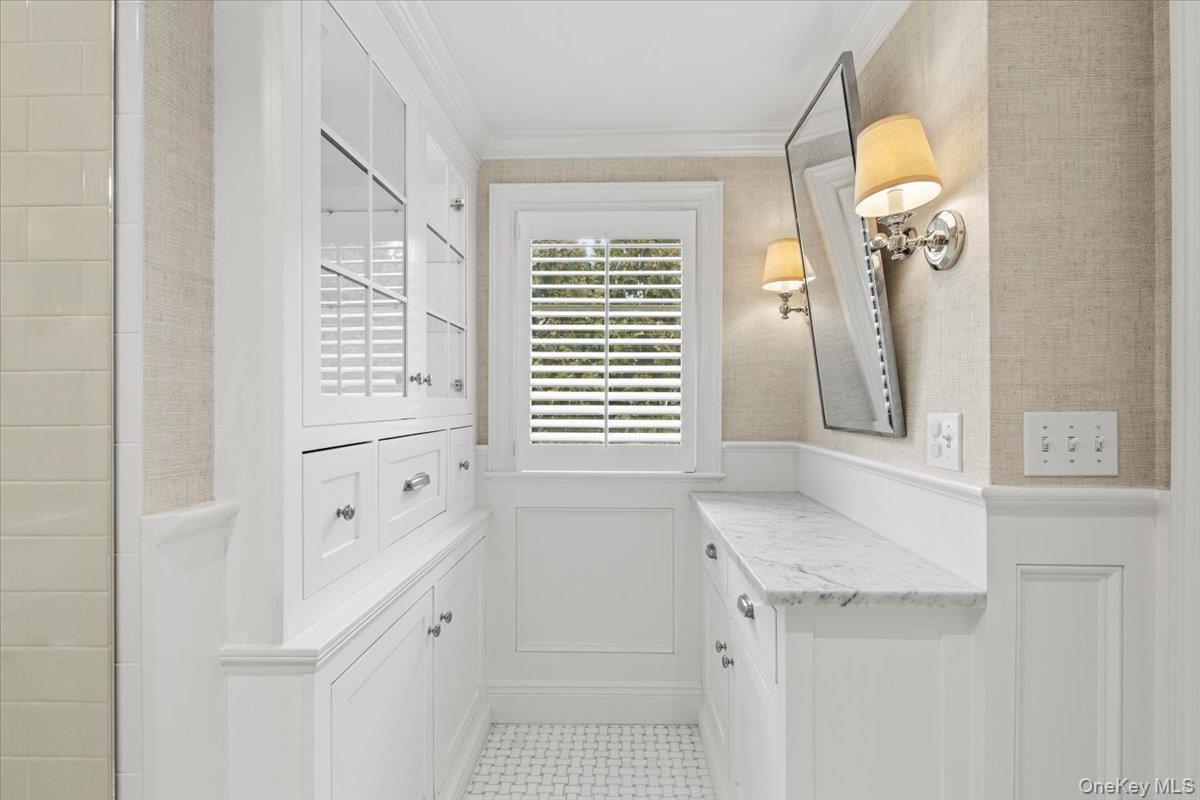 2 Cowles Avenue Rye, NY 10580 - Photo 24 of 35 a bathroom with a sink a toilet and a mirror