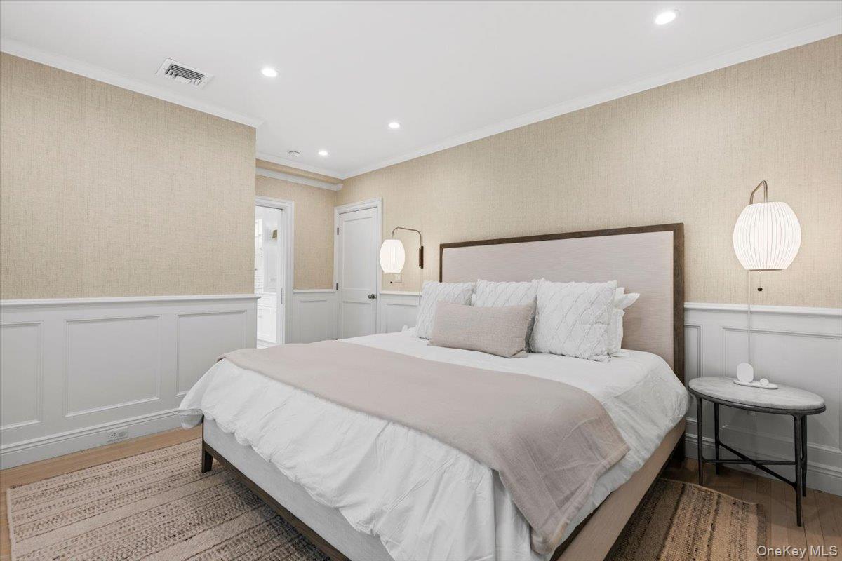 2 Cowles Avenue Rye, NY 10580 - Photo 27 of 35 a bedroom with a bed and a lamp