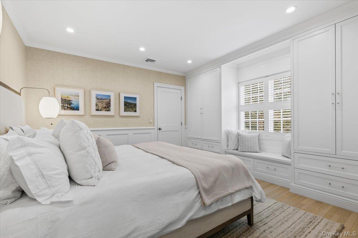 2 Cowles Avenue Rye, NY 10580 - Photo 28 of 35 a bedroom with a large bed and a window
